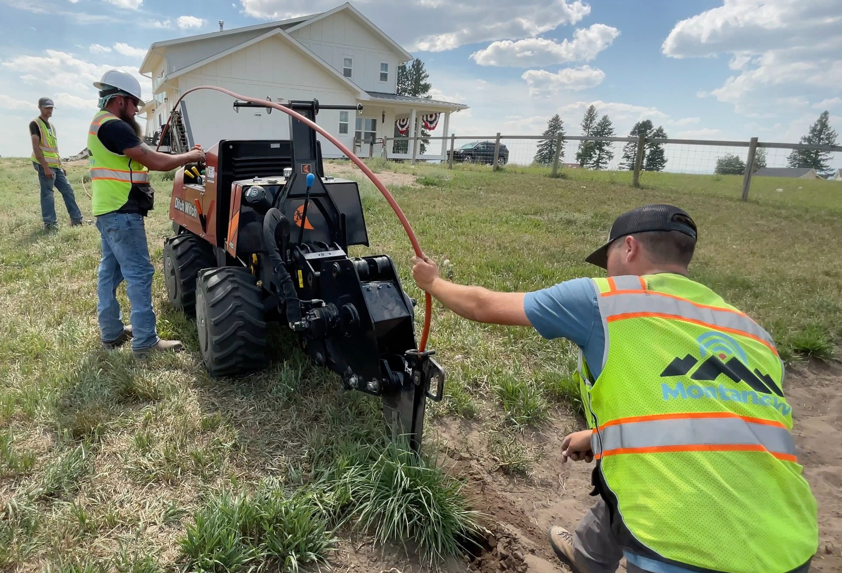 MontanaSky technicians installing fiber connection at a rural home